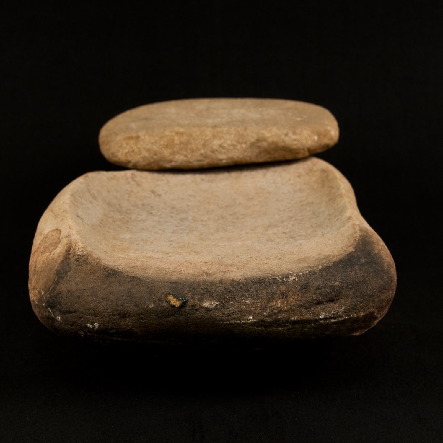A mano and metate, used for grinding corn into meal.